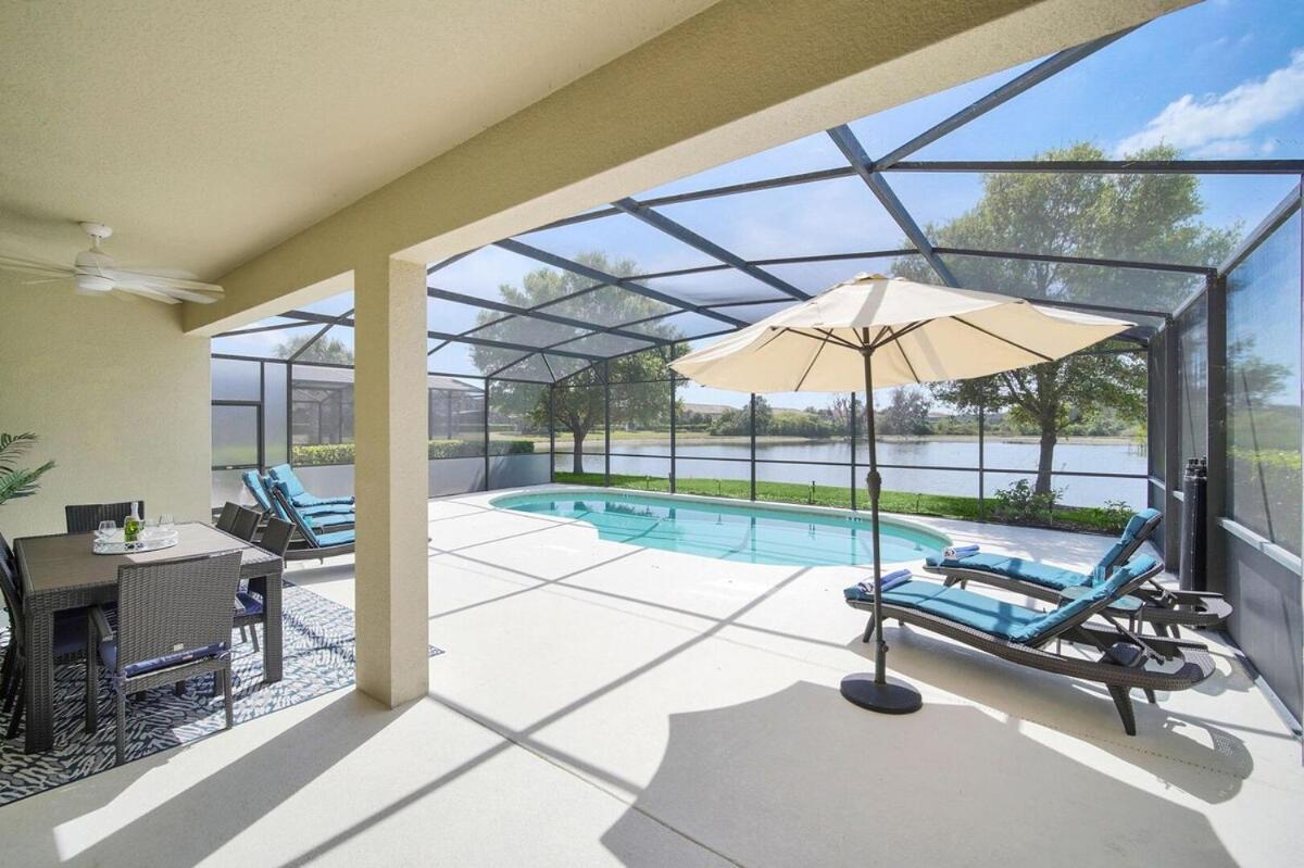 Stunning Lake View From South Facing Extended Pool Deck With Games Room On Gated Solterra Resort Davenport Exterior photo